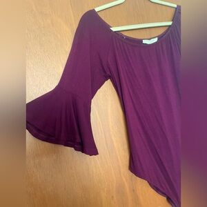 maroon body suit with 3/4 flutter sleeves